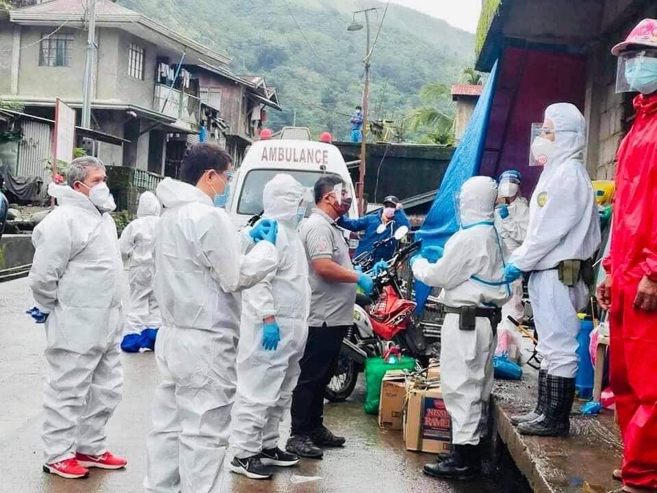 Darwin Estrañero in Bangad, Tinglayan wearing full PPE